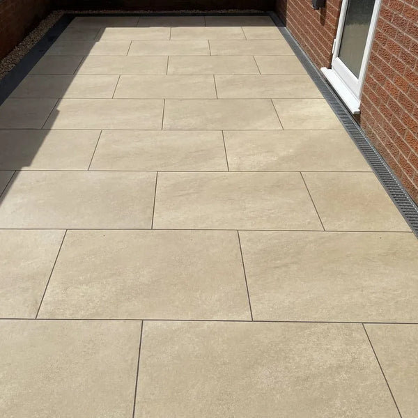 hammerstone beige porcelain paving 900 x 600