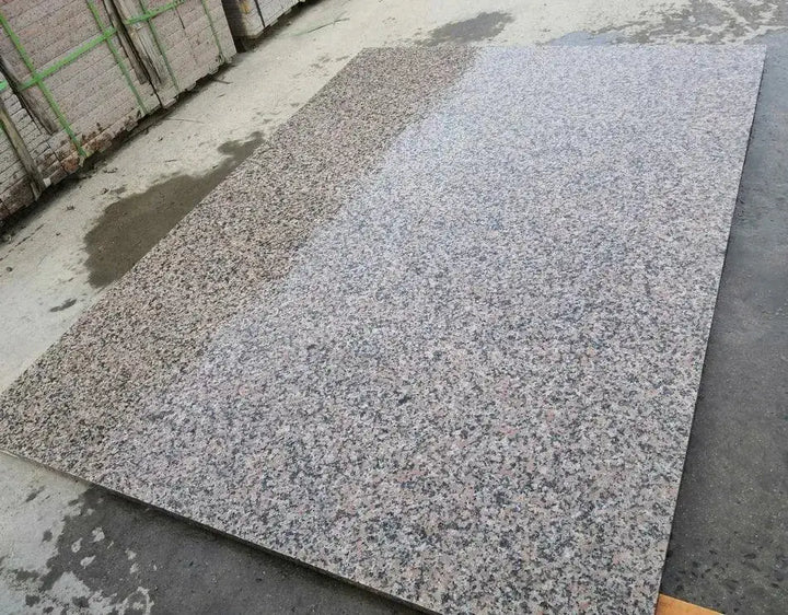 red granite paving 900x600